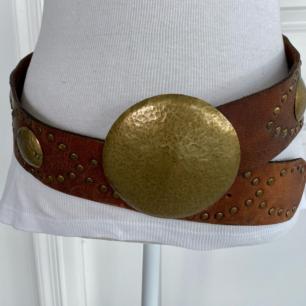Beautiful leather belt with brass buckle and detail. S/M